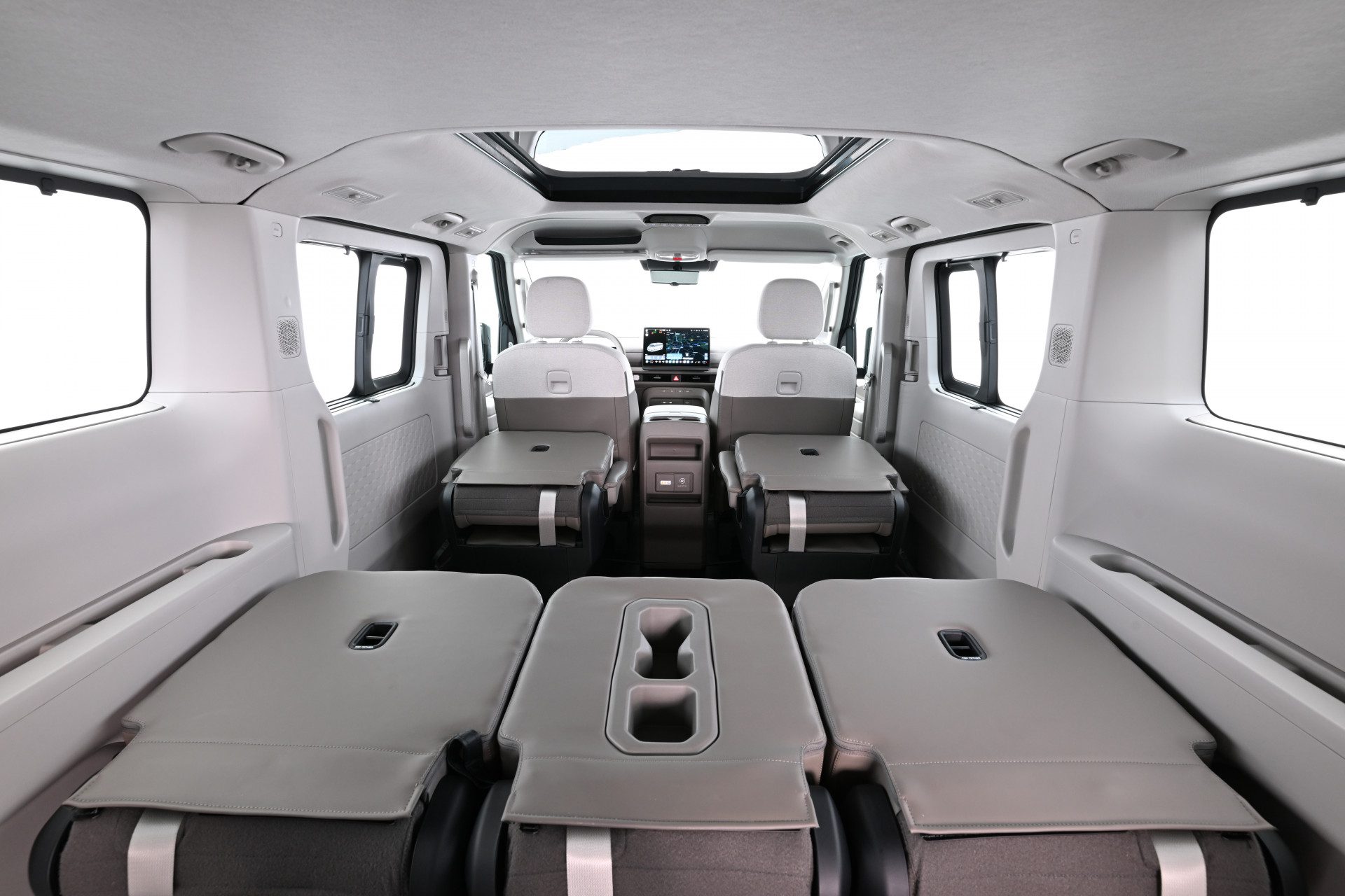 Interieur Kia PV7 Passenger met neergeklapte stoelen