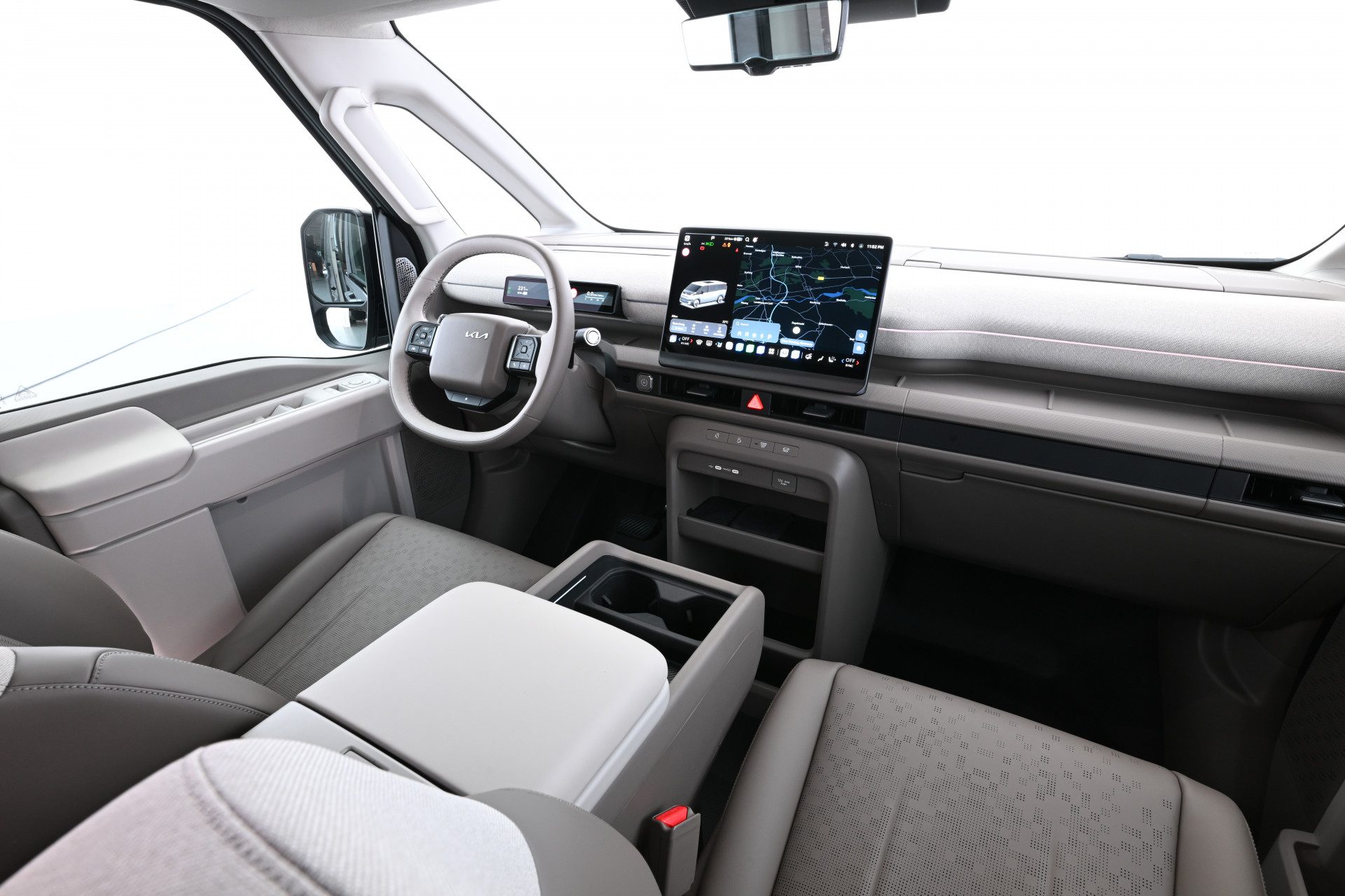 Dashboard Kia PV7 Passenger met twee schermen