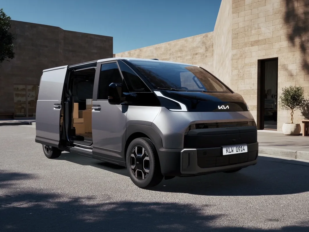 Kia PV7 Cargo met open schuifdeur en pakketten